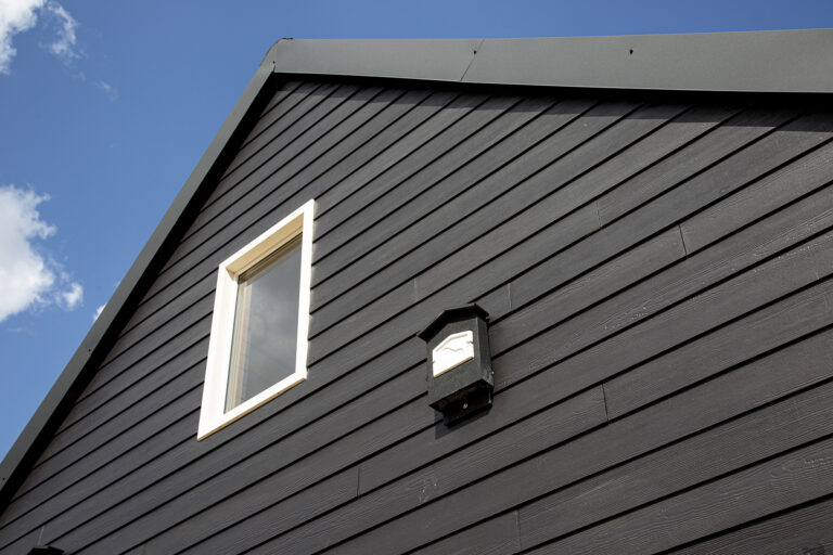 How Professional Cladding Painting Boosts Image and Performance